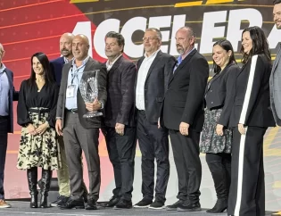 premium guard team stands on stage to accept advance auto parts' inaugural Professional Excellence Champion award.